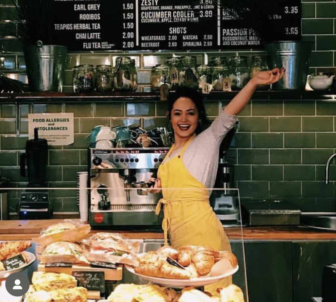 Chef at The Yard Café preparing fresh, homemade pastries and sandwiches in the kitchen